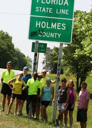 From left are Jerre Brimer, Whitney Tindall, Heath Sherrer, Samson Kipchirchir, Jamie Logan, Nicole Dieckow, Leigh-Ann Strain, Karen Rader, Pat Murphy and ... - learning-tree-bikersjpg-24623d198add64a7