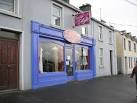 A second-hand clothes shop on the main street, Ballymote. - via Daymix