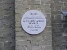 This Plaque is situated on the wall of Hooker House in Quay Street. - via Daymix
