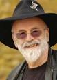 terry-pratchett With nearly 60 books under his belt, Terry Pratchett has ... - terry-pratchett-215x300