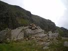 harder routes onto the perpendicular summit. A series of slings ('tat') - via Daymix