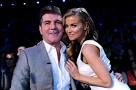 Simon Cowell and Carmen Electra dating and she is desperate to be