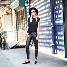 Pointed-toe loafers and leather make for an all-black outfit ...