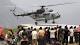 India floods: Bad weather delays rescue and mass cremations