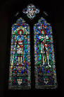 Stained glass window of St Michael and St George in St Martin's church, - via Daymix