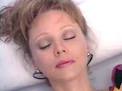 Shelley Long lies dead after choking on food in the comedy Hello Again - Shelley_Long_-_Hello_Again