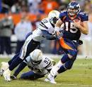 Broncos 'are behind TIM TEBOW' but will consider drafting Cam Newton