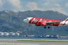 Divers resume search for missing AirAsia jet; no pings detected.