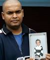 TOO YOUNG: Suresh Narayan holds a recently taken photo of his son Sharvesh. - 768453