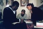 Derek Luke, director Denzel Washington and Joy Bryant on the set ...