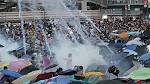 Hong Kong Police Use Tear Gas On Large Pro-Democracy Protest.