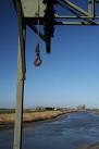 The lifting apparatus frames the tidal river downstream of Denver Sluice. - via Daymix