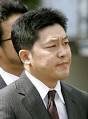 Verdict in: Dr. Katsuhiko Kato walks to the Fukushima District Court on ... - nn20080821a1a