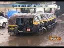 Rains stop Mumbai in tracks, commuters hit as trains cancelled.