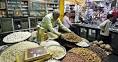 Govt suspends FDI in retail till consensus reached, Parliament ...