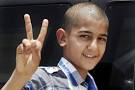 Ali Hasan, flashes the victory sign after he was released on bail. - ali-hasan