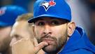 Blue Jays' Jose Bautista watches from the dugout during a game against the ... - bautista-jose_940-8col