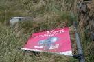 The remains of the lamp post carrying the Digital TV ad which lasted little - via Daymix