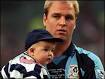 David Busst holds his son during his testimonial game for Coventry City - _41354936_busst203