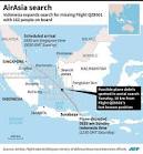 QZ8501 live report: Rescuers start retrieving bodies, debris from.