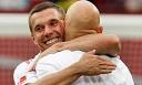 Cologne's Lukas Podolski hugs