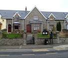 the lawn shows that the centre is shared by two Christian denominations. - via Daymix