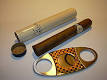 http://upload.wikimedia.org/wikipedia/commons/thumb/8/8a/Cigar_tube_and_cutter.jpg/220px-Cigar_tube_and_cutter.jpg