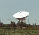 The large white dish is one of many radio telescopes in the area, - via Daymix