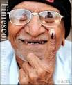 Smiling Ramchandra Laxman Jadhav, a 95-year-old voter shows off his inked - Ramchandra-Laxman-Jadhav