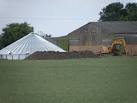 A grain bin under construction, starting with the top, the whole structure - via Daymix