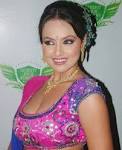 Sana Khan In Wet Saree