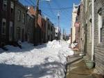 Maryland Weather: Front loader visits South Dallas Street.