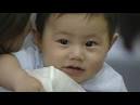 Abe Hiroshi makes a baby cry. Abe Hiroshi makes a baby cry