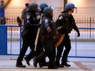 Protesters Smash Out Police Car Windows and Storefronts as.