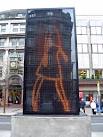 Lady walking (sometimes she's a man) - via Daymix
