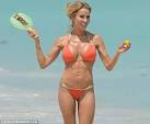 Real Housewives star Lisa Hochstein threatens to spill out of her