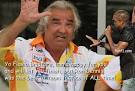 http://www.formulaf1.com/wp-content/uploads/2009/09/kanye-west-flavio-briatore.jpg