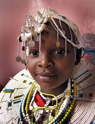 The end of childhood: A child bride is pictured in Tanzania. Alemtsayhe Gebrekidan has told of how she suffered a similar fate when she married age 10 - article-2543166-1AD97AE600000578-310_634x829