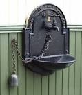 Cast iron drinking water facility from a bygone age on the platform at the - via Daymix