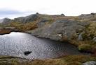 it's a typical Rough Bounds summit, a series of rocky knolls and pools. - via Daymix