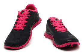 black and hot pink nike free shoes - $45.00