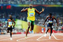 Jamaica's Usain Bolt breaks world record in 200, gets sprint ...