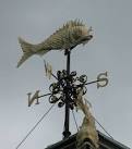 TQ3380 : Weather vane on old - via Daymix