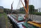 A flat bottomed sailing boat, common during the 19th and early 20th century. - via Daymix
