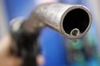 Petrol price hiked by 64 paise a litre, diesel price cut by Rs.