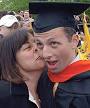 ... and engineering major, receives a kiss from his mother, Jackie Kaplan. - inrev_commencement3