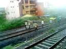 Rains stop Mumbai in tracks, commuters hit as trains cancelled.