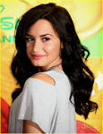 Demi Lovato looks over her shoulder as she arrives at the Disney and ABC ... - images?q=tbn:ANd9GcSiEf7NUZja-4q0igy3sfxj0xW2aCrKFvf3758YyFzdRJ2pE7UAdL6kyyhB