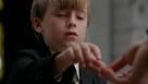 Jacob lends James a pen.