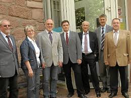 Martin Hahn, Gisela Volz, Günter Stricker, Sebastian Plüer, Manfred Dunst, Jens Häußler und Volker Bäuerle (von links) bei der Stabübergabe.